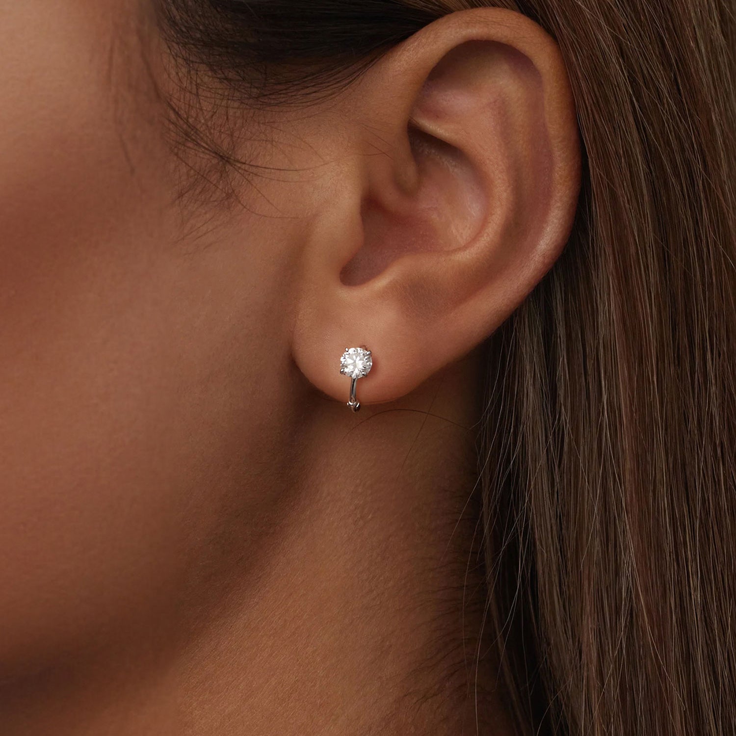 Four-Prong Solitaire Moissanite Huggie Earrings | Sterling Silver