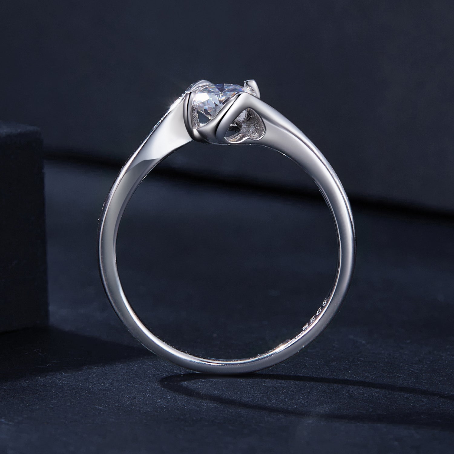 Elegant Twist Solitaire Moissanite Ring | Sterling Silver